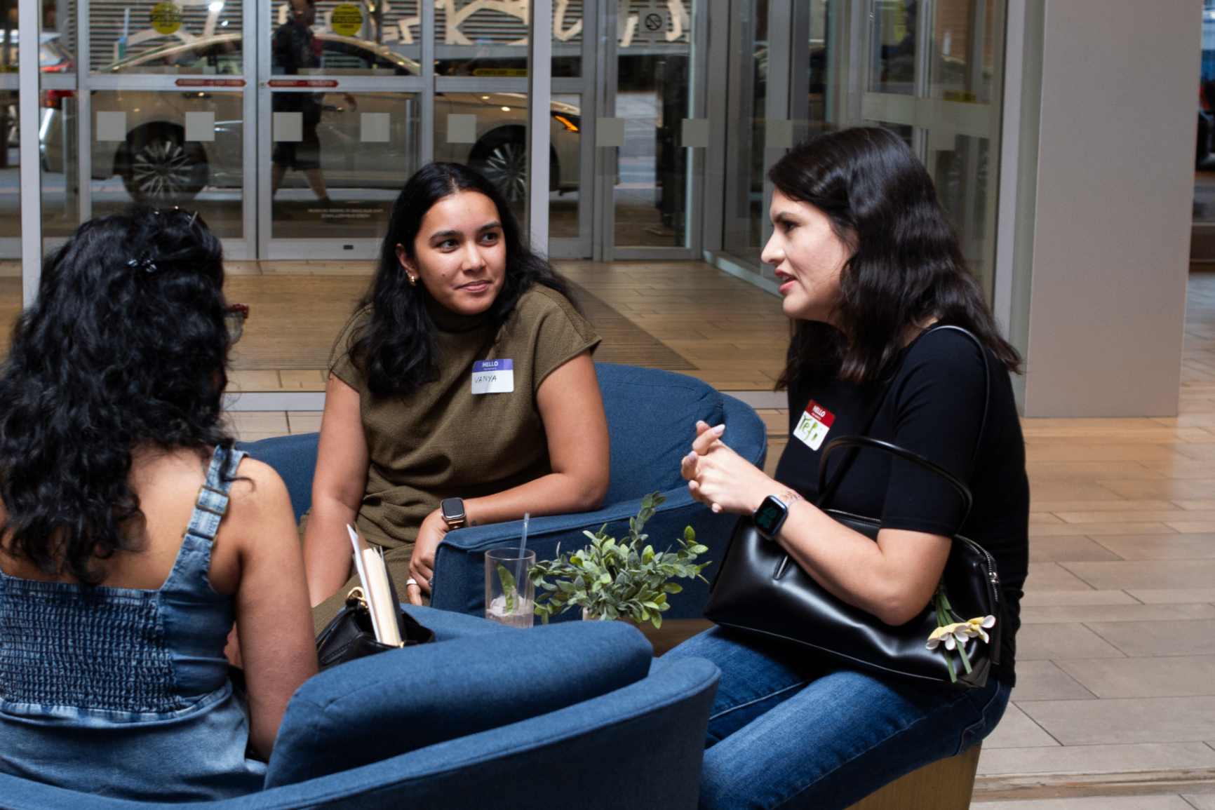 Small group conversation in the lounge before the event