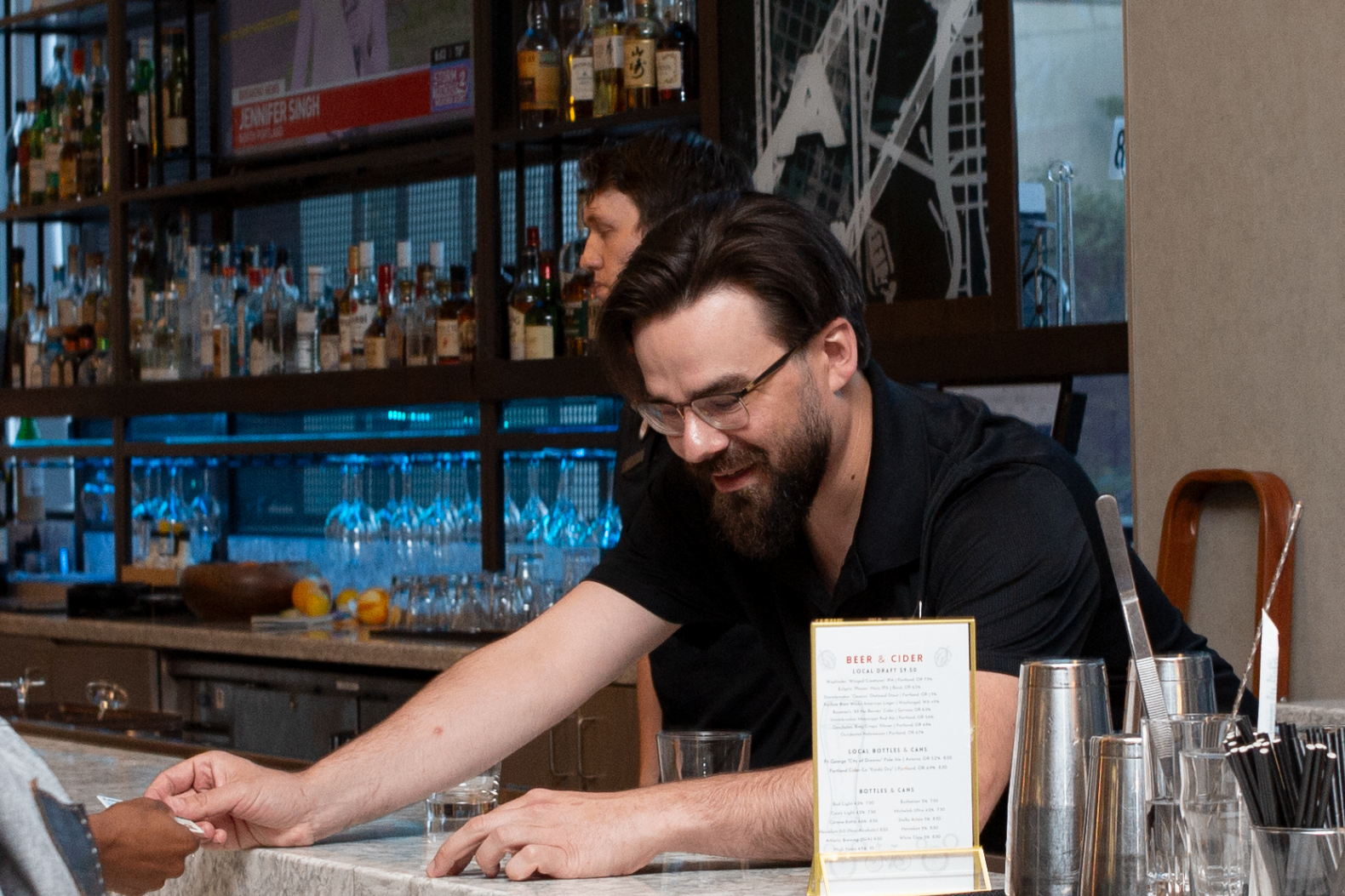 Guest checking in at the bar during a chapter event